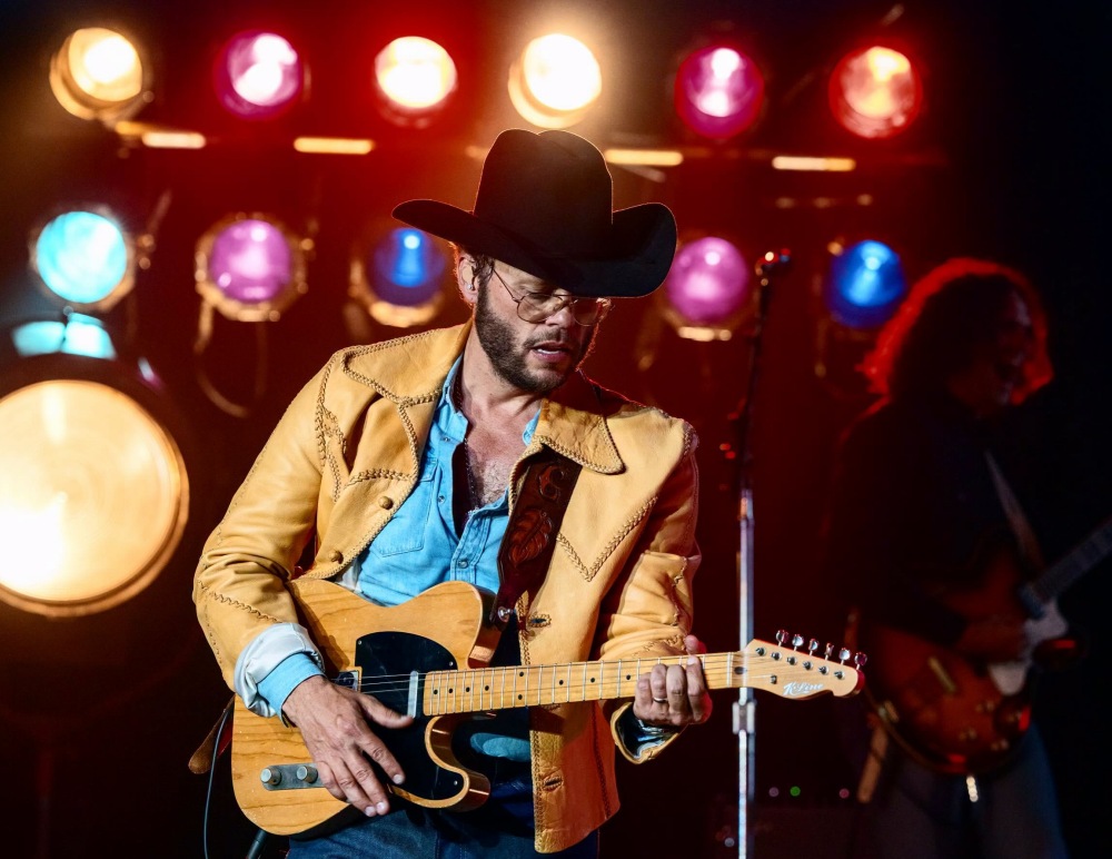 Charley Crockett plays guitar in Charles Town, WV