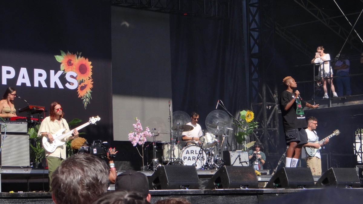 Arlo Parks performing live on stage