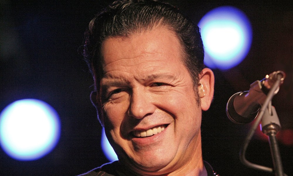 Tommy Castro playing guitar, ahead of his Kessler Theater blues show