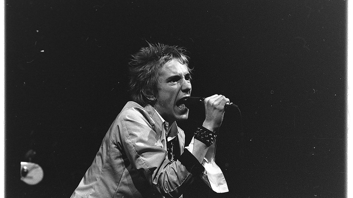 Archival photo of the Sex Pistols performing in 1977