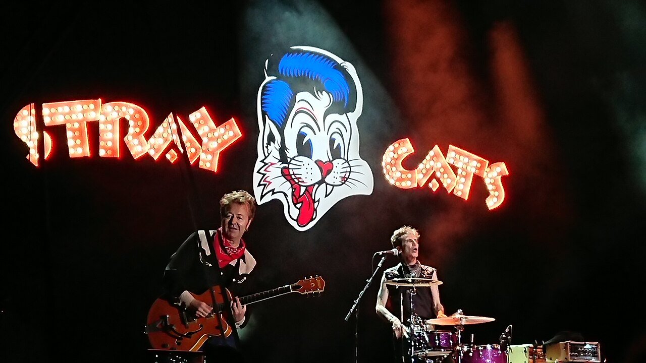 Brian Setzer and Slim Jim Phantom of the Stray Cats performing in 2019
