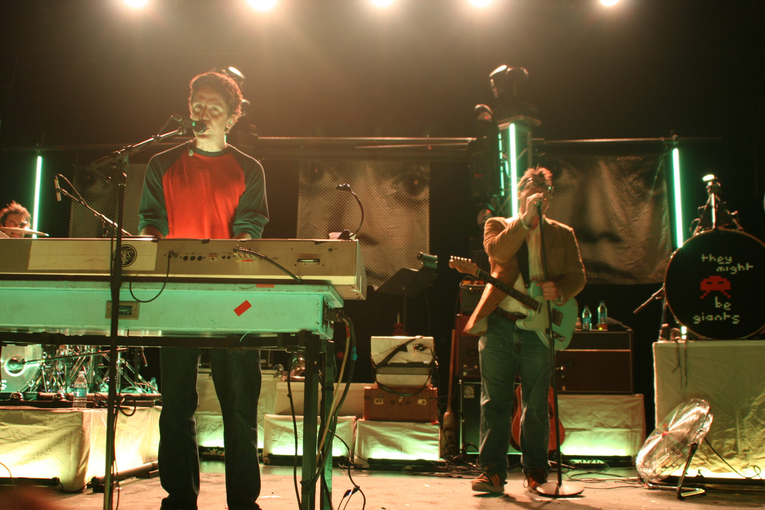 They Might Be Giants performing on stage