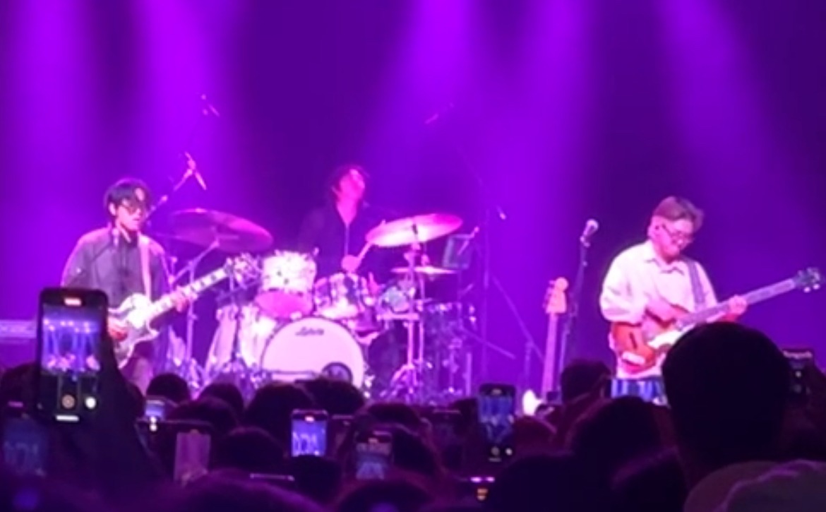 South Korean band wave to earth performing at Irving Plaza in New York City in 2023