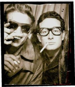Waylon Jennings and Buddy Holly photographed together in 1959, the year of the Winter Dance Party tour
