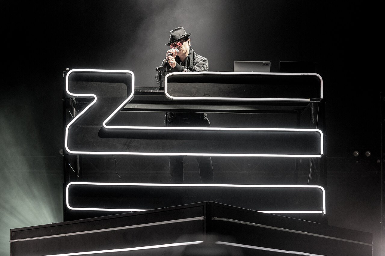 Electronic artist Zhu performing behind his illuminated stage set